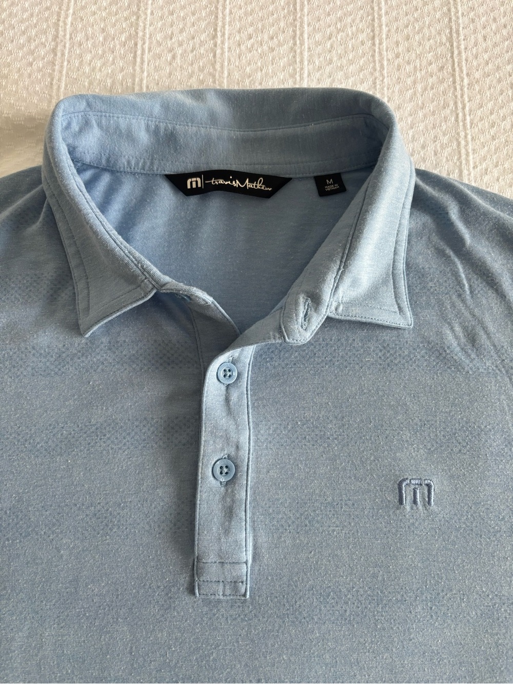 Travis Mathew Men's Pale Blue Polo with Subtle Logo